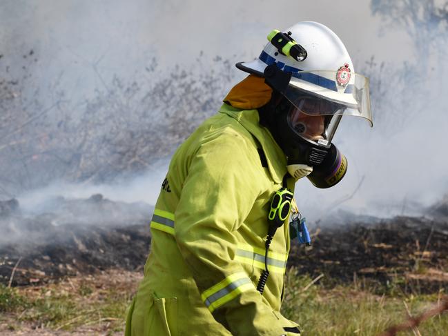 Queensland Fire and Emergency Services, including Rural Fire Service crews, contained a 20ha vegetation fire at Hay Point on Tuesday November 24. Generic QFES, RFS, firefighter. Picture: Zizi Averill