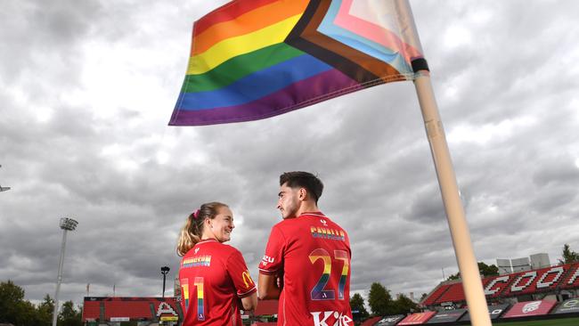 ADELAIDE UNITED PRIDE GAME. Adelaide United soccer players Isabel Hodgson and Josh Cavallo at Coopers Stadium Hindmarsh, on the 21st Feb, 2022. Picture: Tricia Watkinson