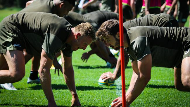 Wingers Reece Hodge and James Ramm face off. Picture: Andrew Phan