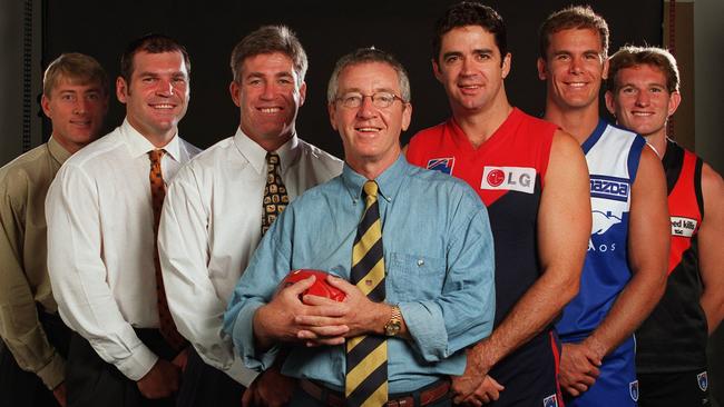 1999. Richard Osborne, Jason Dunstall, Gerard Healy, Mike Sheahan, Garry Lyon, Wayne Carey and James Hird. HWT staff.