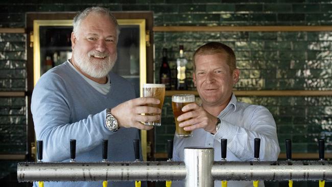 Owner-chef Geoff Lindsay and venue manager Paul Bryant toast the return of the Yarck Hotel. Picture: Zoe Phillips