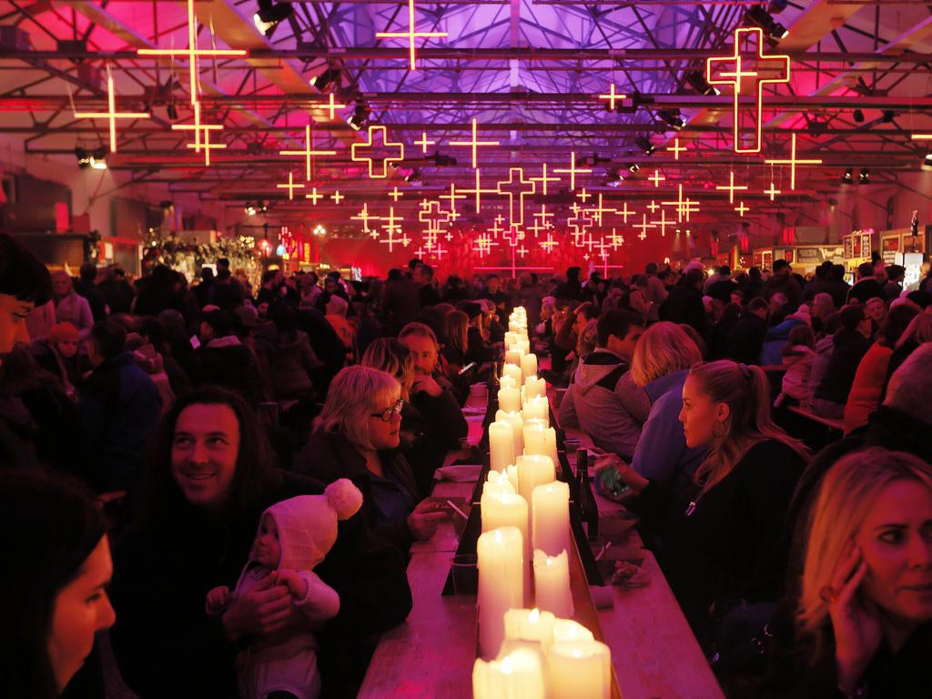 People enjoying the Dark Mofo Winter Feast. Picture: MATHEW FARRELL