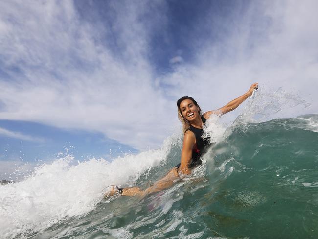 Fitzgibbons is mixing her love with surfing with business as she creates a fitness app as well. Picture: Brett Costello