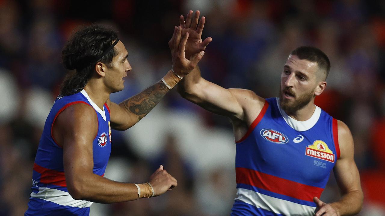 Ugle-Hagan and skipper Marcus Bontempelli celebrate. (Photo by Daniel Pockett/Getty Images)