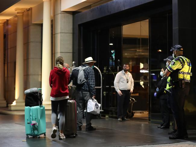 Costa Victoria passengers arrive at the Duxton Hotel after the cruise from hell. Picture: Getty