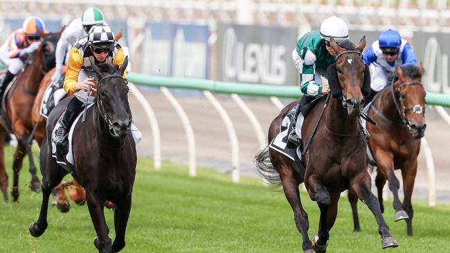 Treasurethe Moment (right) winning the Wakeful Stakes from Powers Of Opal at Flemington. Picture: Morgan Hancock/Racing Photos via Getty Images