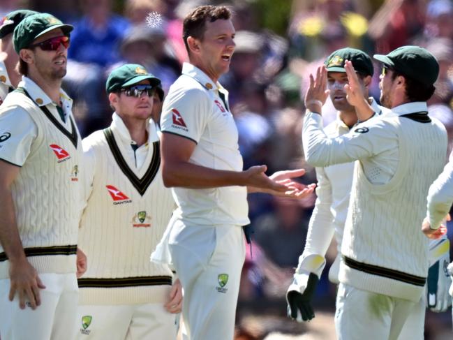 osh Hazlewood took five wickets as Australia rolled NZ for 162 in the first innings. Picture: Getty Images