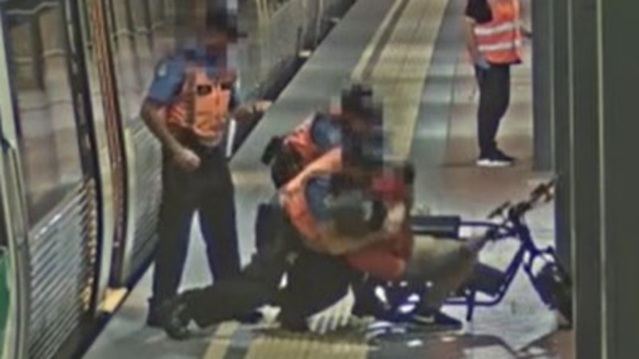 Wild moment cyclist tackled at station