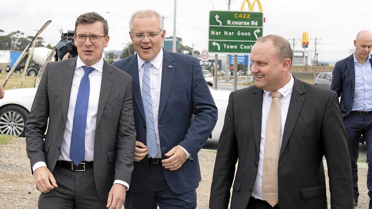 Minister for Cities, Urban Infrastructure and Population Alan Tudge (left), Prime Minister Scott Morrison (centre) and Liberal Member for La Trobe Jason Wood (right) are seen during an announcement in Melbourne, Thursday, March 21, 2019. Picture: ELLEN SMITH