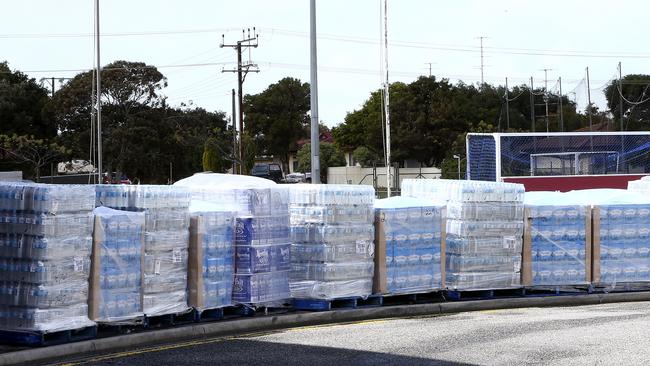 Bottled water stored at the Ravendale Community Sports Centre. Picture: Sarah Reed