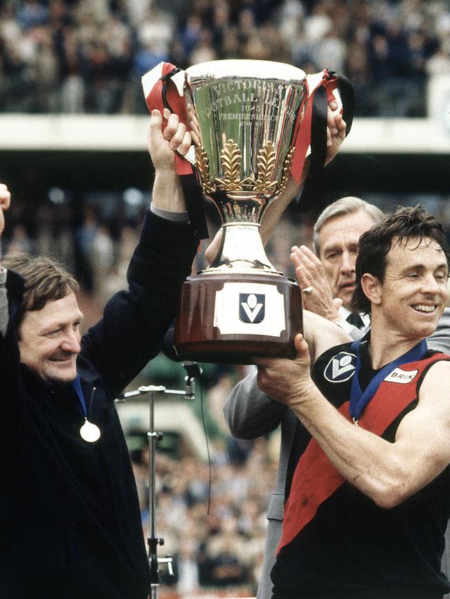 Kevin Sheedy and Terry Daniher with the 1985 premiership cup.