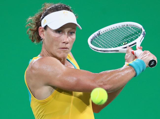 RIO DE JANEIRO, BRAZIL - AUGUST 09: Samantha Stosur of Australia hits during the women's third round singles match against Angelique Kerber of Germany on Day 4 of the Rio 2016 Olympic Games at the Olympic Tennis Centre on August 9, 2016 in Rio de Janeiro, Brazil. (Photo by Cameron Spencer/Getty Images)