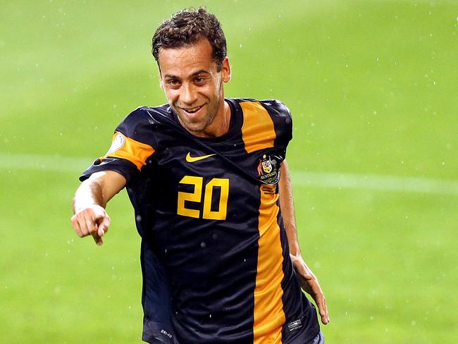 Brosque celebrates scoring for the Socceroos against Saudi Arabia in 2012.