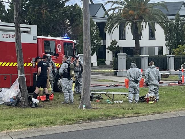 Specialist crews are wearing full hazmat suits to clean up the mess. Picture: Nilsson Jones