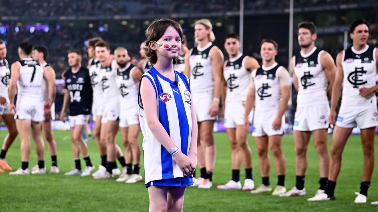 Imogen Mulgrew, 11, will present the premiership cup to North Melbourne if the Kangaroos win the AFLW grand final at Ikon Park on Saturday night. Picture: Quinn Rooney / Getty Images