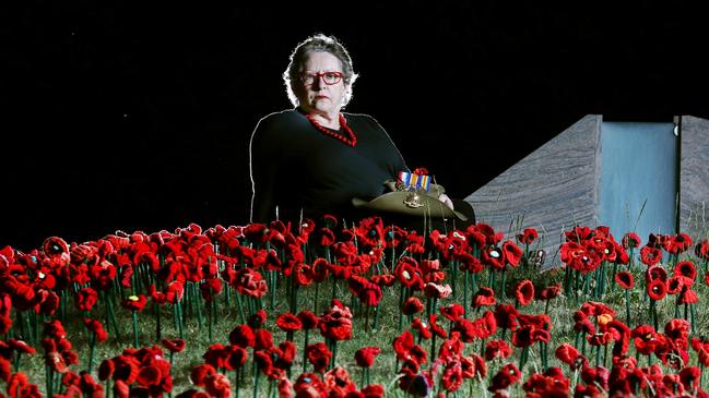 Irene Darby, 67 years, at the Australian War Memorial in Canberra where 60,000 poppies mark the centenary of the end of World War I.Irene was contacted by the Department of Defence and her DNA was used to confirm the identity of a recently recovered Australian Digger 3625 Lance Corporal James Leonard Rolls- her great uncle. Leonard was killed in action on 3 May 1917 but remained undiscovered until recently.Each poppy represents an Australian life lost in World War I.Picture Gary Ramage