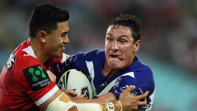 Bulldogs Josh Jackson I shackled by St George's Tim Lafai during the Bulldogs v St George rugby league match at ANZ Stadium, Sydney. Picture: Brett Costello