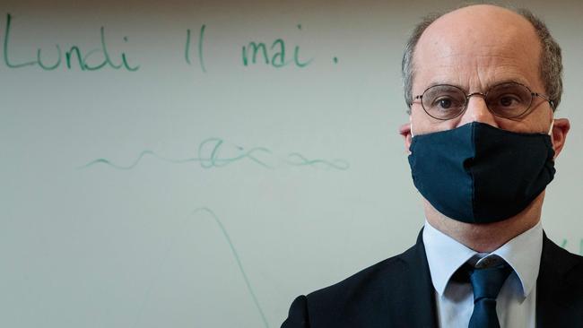 French Education and Youth Affairs Minister Jean-Michel Blanquer wearing a mask visits a school in Paris. Picture; AFP.