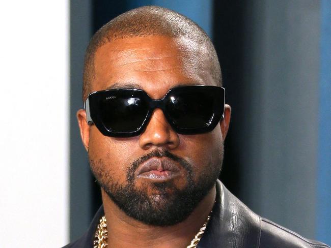 (FILES) In this file photo taken on February 10, 2020 US rapper Kanye West attends the 2020 Vanity Fair Oscar Party following the 92nd annual Oscars at The Wallis Annenberg Center for the Performing Arts in Beverly Hills, USA. - Kanye West declared his "love" of Nazis and admiration for Adolf Hitler on Thursday, sparking outrage as another commercial partner announced it was splitting from the troubled superstar. In an extraordinary hours-long appearance on Infowars, the show fronted by conspiracy theorist Alex Jones, West -- now known as Ye -- wore a black mask completely covering his face, as he ranted about sin, pornography and the devil. (Photo by Jean-Baptiste Lacroix / AFP)