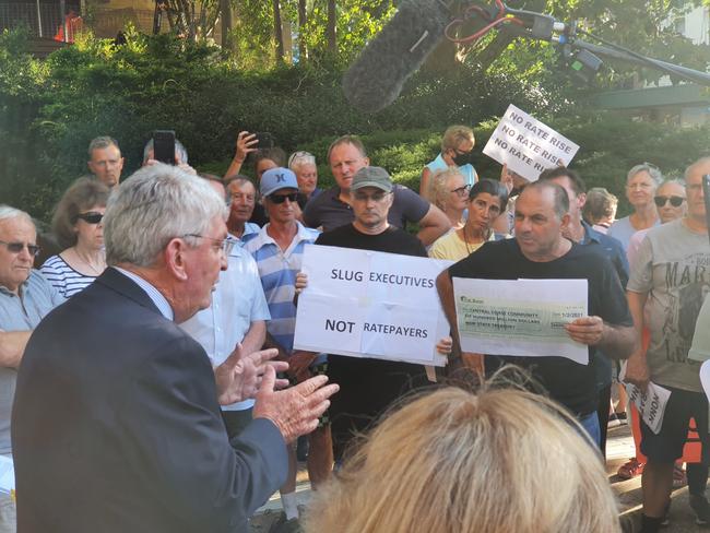 Protesters outside Central Coast Council in Gosford demanding answers into the financial crisis.