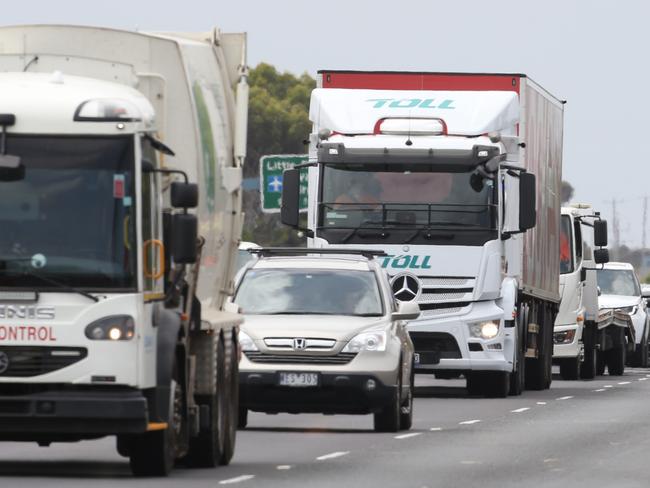 Traffic backing up at the scene of a fuel spill on the Princes Freeway. Fuel tanker with punctured tank spilling oil. Firefighters and police on scene. Incident causing tailbacks Geelong bound. Picture: Alan Barber