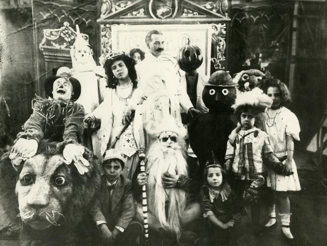 L. Frank Baum (cenmtre back) with the cast of The Fairylogue and Radio Plays a film/live action show based on his books in 1908.