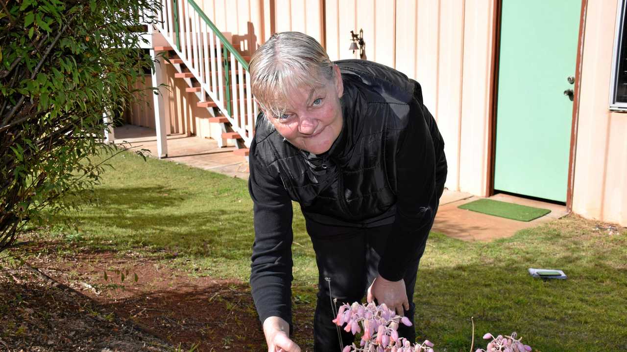 Kimberley Jones in the garden of her new home. Picture: Christian Berechree