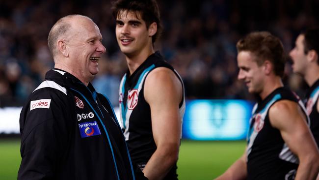 ADELAIDE, AUSTRALIA - SEPTEMBER 13: Ken Hinkley, Senior Coach of the Power exchanges words with Hawthorn players after the 2024 AFL Second Semi Final match between the Port Adelaide Power and the Hawthorn Hawks at Adelaide Oval on September 13, 2024 in Adelaide, Australia. (Photo by Michael Willson/AFL Photos via Getty Images)