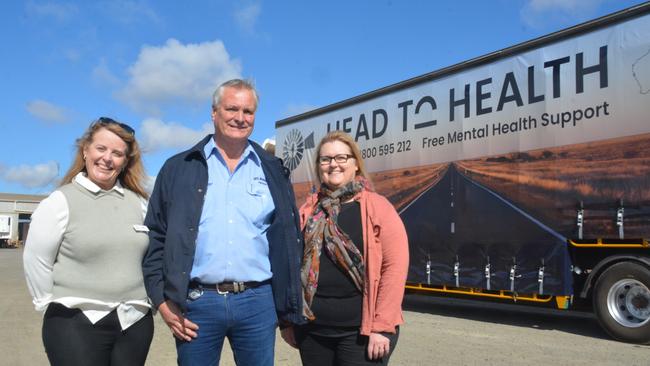 Encouraging residents in rural and remote communities to access the Head to Heath mental health phone service are (from left) Deb Spanner from the Western Queensland Primary Health Network, Neil Mansell Transport director Robert Mansell and RHealth general manager Michelle Sieders.