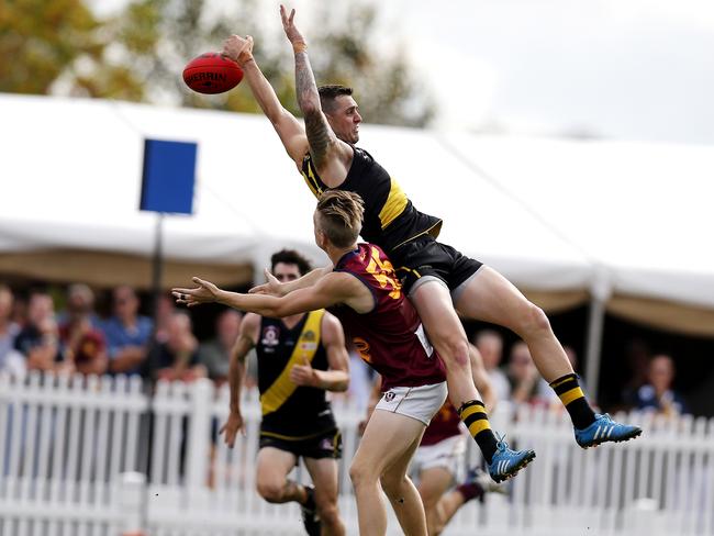 Labrador's Bryce Retzlaff and Palm Beach Currumbin's Max Spencer Joshua Lys in action. Photo: Jerad Williams