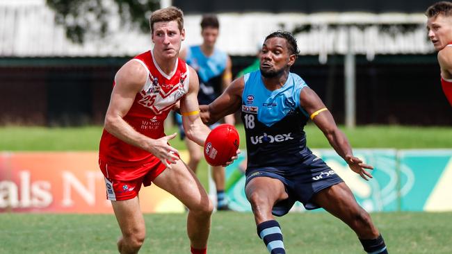 Jack Gleeson of Waratah and Ishmael Palmer of Buffaloes during Round 17 of the 2023-24 NTFL season. Picture: Celina Whan / AFLNT Media