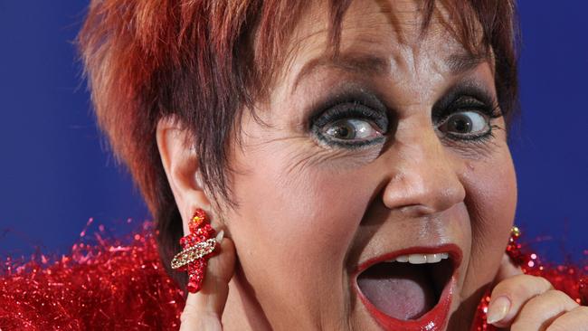 2012: Oversized earrings might be her trademark but Anne Wills' customised, blinged up Legacy pair were closest to her heart when this photo was taken. She acted as an honorary ambassador to support Legacy Week in 2012.