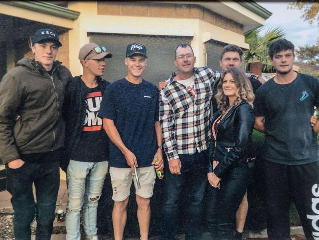 Seb O'Halloran (centre navy T shirt) pictured with his family.