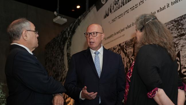 Opposition Leader Peter Dutton has visited the Yad Vashem holocaust museum in Israel with museum guide Liz Elsby and Yad Vashem chair Dani Dayan.