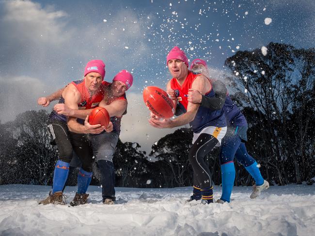 Ian Johnson on left, taking part in a charity match to help raise money for MND research. Picture: Jake Nowakowski