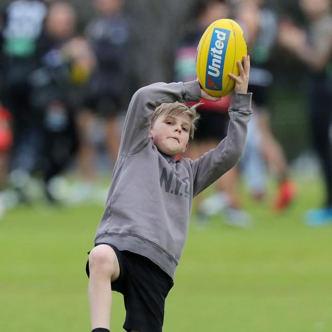 Ayce Buckley takes a mark at Collingwood training. Picture: Michael Klein.