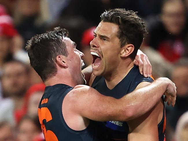 SYDNEY, AUSTRALIA - APRIL 17: Brent DanielsÃÂ and Josh Kelly of the Giants celebrate Kelly kicking a late goal during the round five AFL match between the Sydney Swans and the Greater Western Sydney Giants at Sydney Cricket Ground on April 17, 2021 in Sydney, Australia. (Photo by Mark Kolbe/AFL Photos/Getty Images)