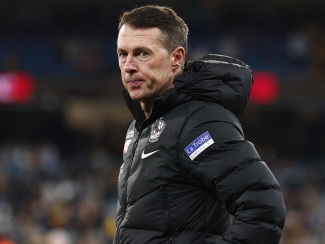 MELBOURNE, AUSTRALIA - AUGUST 05: Magpies head coach Craig McRae looks dejected after the round 21 AFL match between Hawthorn Hawks and Collingwood Magpies at Melbourne Cricket Ground, on August 05, 2023, in Melbourne, Australia. (Photo by Daniel Pockett/Getty Images)