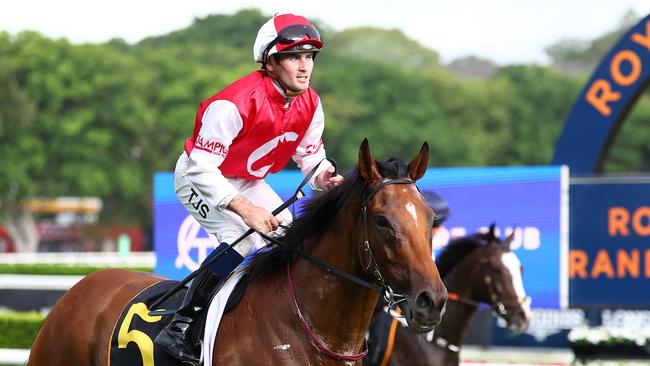 SYDNEY, AUSTRALIA - DECEMBER 26: Tyler Schiller riding Lion's Roar wins Race 7 Schweppes Summer Cup during Sydney Racing at Royal Randwick Racecourse on December 26, 2023 in Sydney, Australia. (Photo by Jeremy Ng/Getty Images)