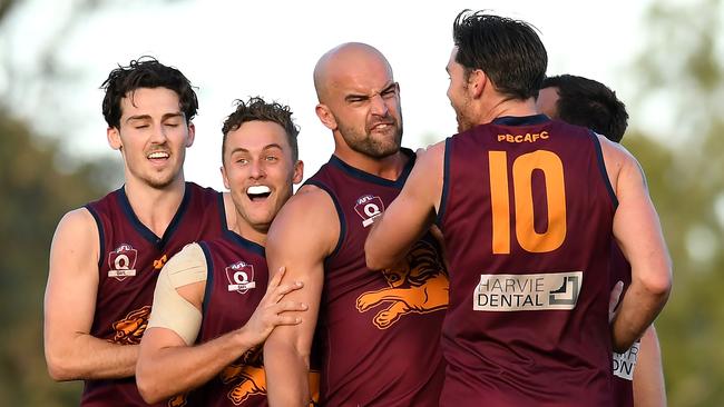 Jack Anthony (second from right) celebrates a goal with teammates on Saturday. Picture: Albert Perez/AFL Media/Getty Images