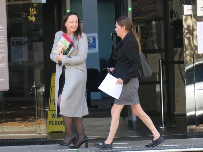 Georgette Smith (right) leaving Wyong Local Court after she was sentenced for high-range drink-driving with her lawyer (left). Picture: NewsLocal