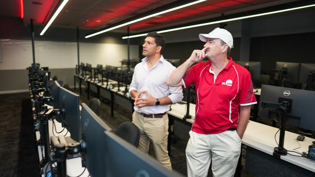 MP Lance McCallum and Cairns TAFE Lecturer Dave Watson in the newly opened cyber security training room. Picture: Nuno Avendano