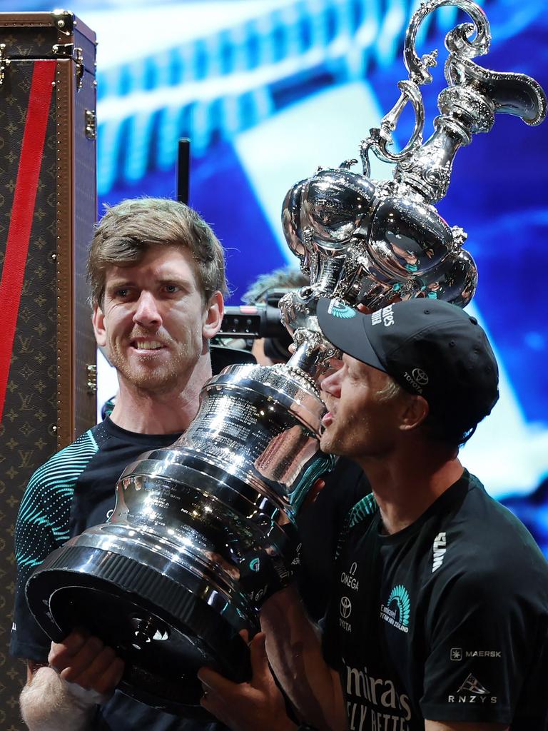 Sailor Peter Burling with the America’s Cup trophy. (Photo by LLUIS GENE / AFP)