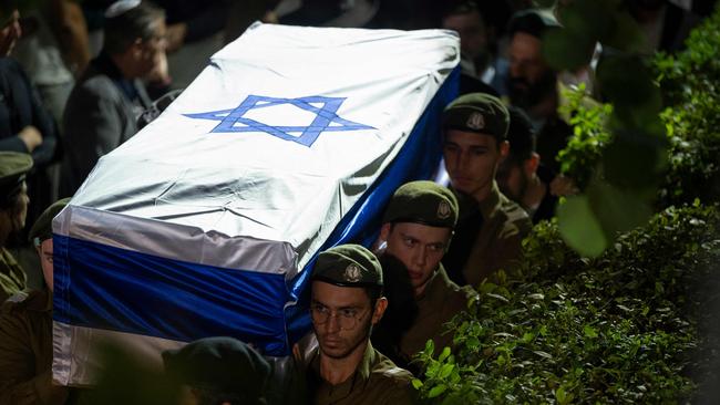 IDF soldiers carry the coffin of Noam Rothenberg at Mount Herzel Cemetery in Jerusalem. Picture: AFP