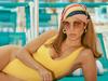 JLo stuns in skimpy yellow swimsuit