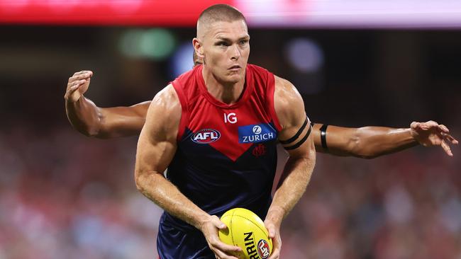 Adam Tomlinson of the Demons with the ball during the Opening Round AFL match between Sydney Swans and Melbourne at SCG on March 7, 2024, in Sydney. (Photo by Matt King/AFL Photos/Getty Images)