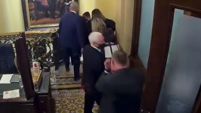 House impeachment managers presented video evidence of then-Vice President Mike Pence being ushered away with his family during the Capitol riots.