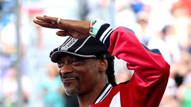 PARIS, FRANCE - AUGUST 09: Snoop Dogg, looks on ahead of the Coup de Baton ceremony prior to the Breaking Competition on day fourteen of the Olympic Games Paris 2024 at Place de la Concorde on August 09, 2024 in Paris, France. (Photo by Elsa/Getty Images)