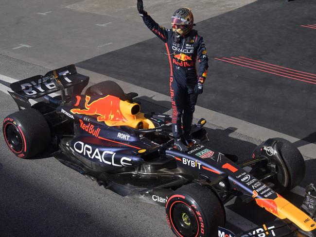 TOPSHOT - Red Bull Racing's Dutch driver Max Verstappen celebrates after winning the Formula One Brazil Grand Prix at the Autodromo Jose Carlos Pace racetrack, also known as Interlagos, in Sao Paulo, Brazil, on November 5, 2023. (Photo by NELSON ALMEIDA / AFP)