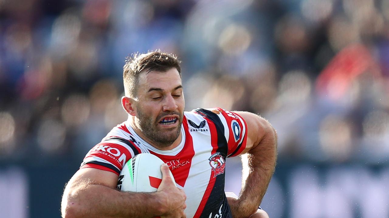 GOSFORD, AUSTRALIA – JUNE 04: James Tedesco of the Roosters is tackled during the round 14 NRL match between Sydney Roosters and Canterbury Bulldogs at Central Coast Stadium on June 04, 2023 in Gosford, Australia. (Photo by Jason McCawley/Getty Images)